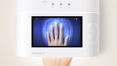 Grâce à la caméra et à l'écran intégrés, il est possible de vérifier le positionnement de la main et un éclairage suffisant.