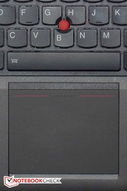 Le touchpad et le trackpoint.