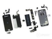 L'iPhone 6, totalement désassemblé. (Source: http://www.iFixit.com)