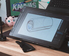 Huion Kamvas 16 Gen 3 sur le bureau avec gant de dessin à stylet et clavier