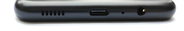 Bas : Haut-parleur, port USB type-C, microphone, prise audio 3,5 mm