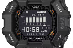 Montre Casio G-Shock Mudman GDG-B100 avec affichage numérique rouge et blanc devant un paysage montagneux escarpé.