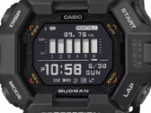 Montre Casio G-Shock Mudman GDG-B100 avec affichage numérique rouge et blanc devant un paysage montagneux escarpé.