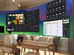 Un utilisateur utilise un bureau virtuel à l&#039;aide du casque Apple Vision Pro (Source de l&#039;image : Apple)
