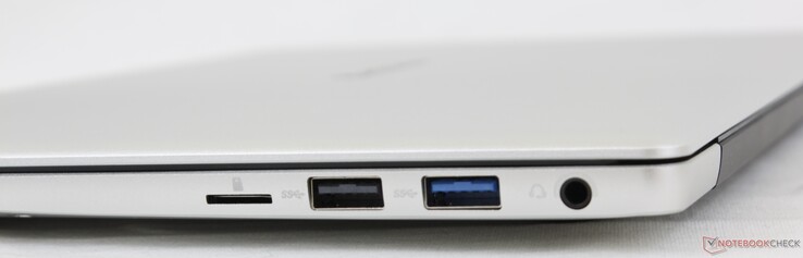 Droit : Lecteur microSD, USB-A 2.0, USB-A 3.0, casque de 3,5 mm