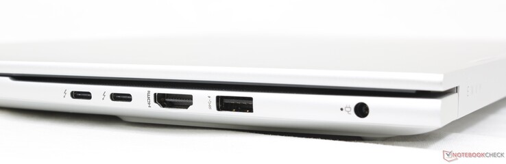 À droite : 2 x USB-C avec Thunderbolt 4 + DisplayPort 1.4, HDMI 2.1, USB-A 10 Gbps, adaptateur secteur